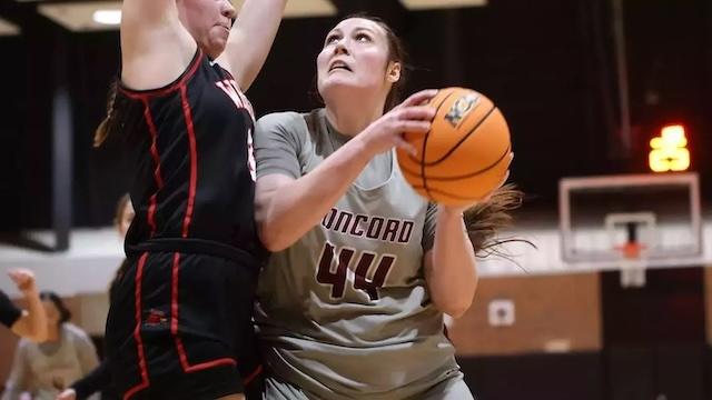 Abbie Smith goes up for a shot in DII women's basketball.